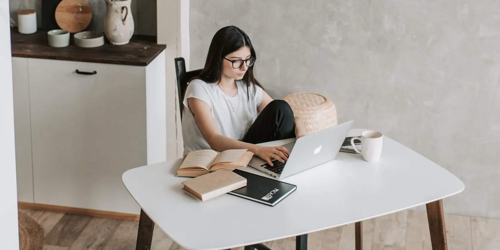 Woman working on laptop at home