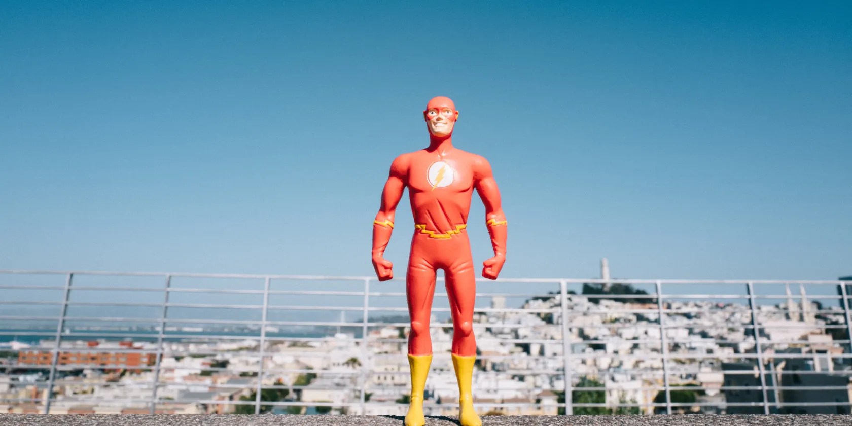 Superhero figure in front of sky