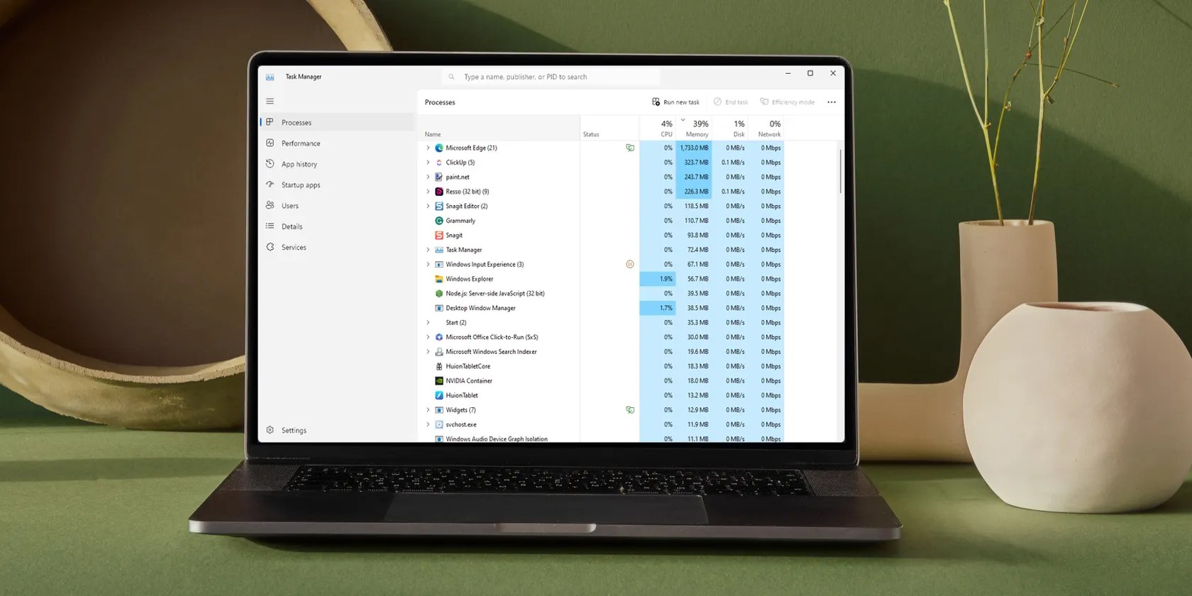 A Laptop With Task Manager Opened