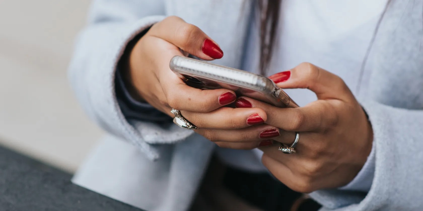 Woman configuring her Android phone
