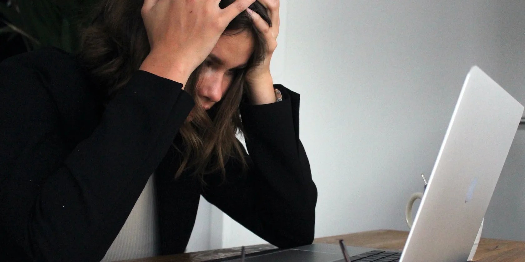 Worried woman on a laptop