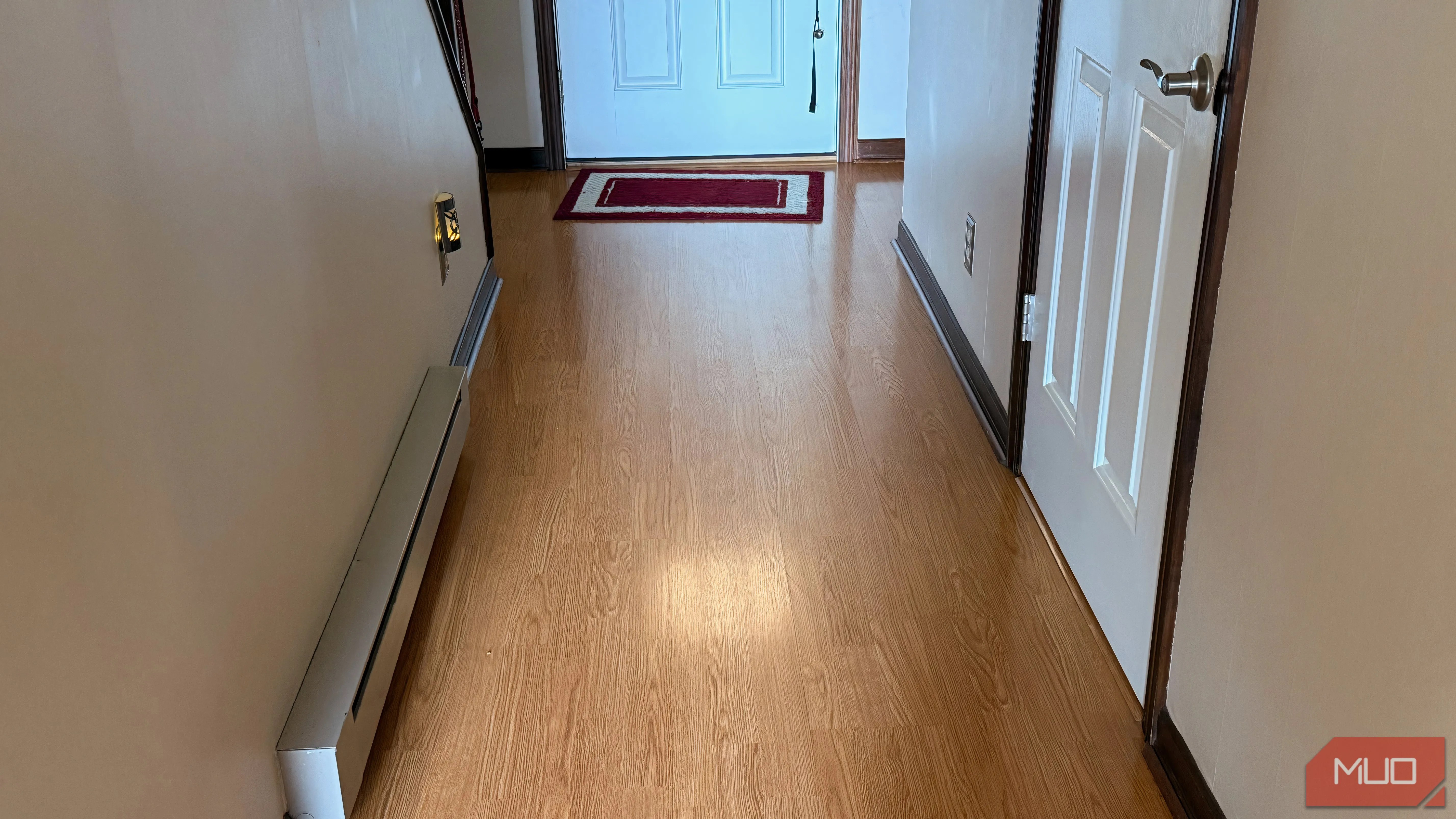 A clean hallway floor in a home.