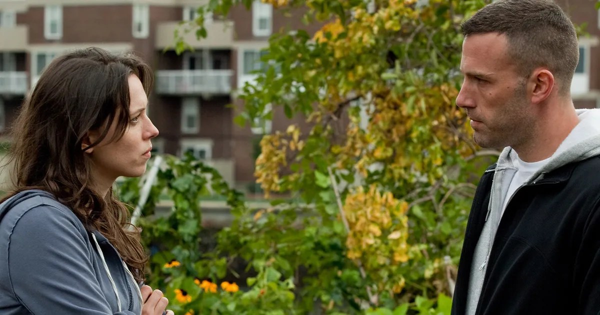 Ben Affleck and Rebecca Hall looking at each other