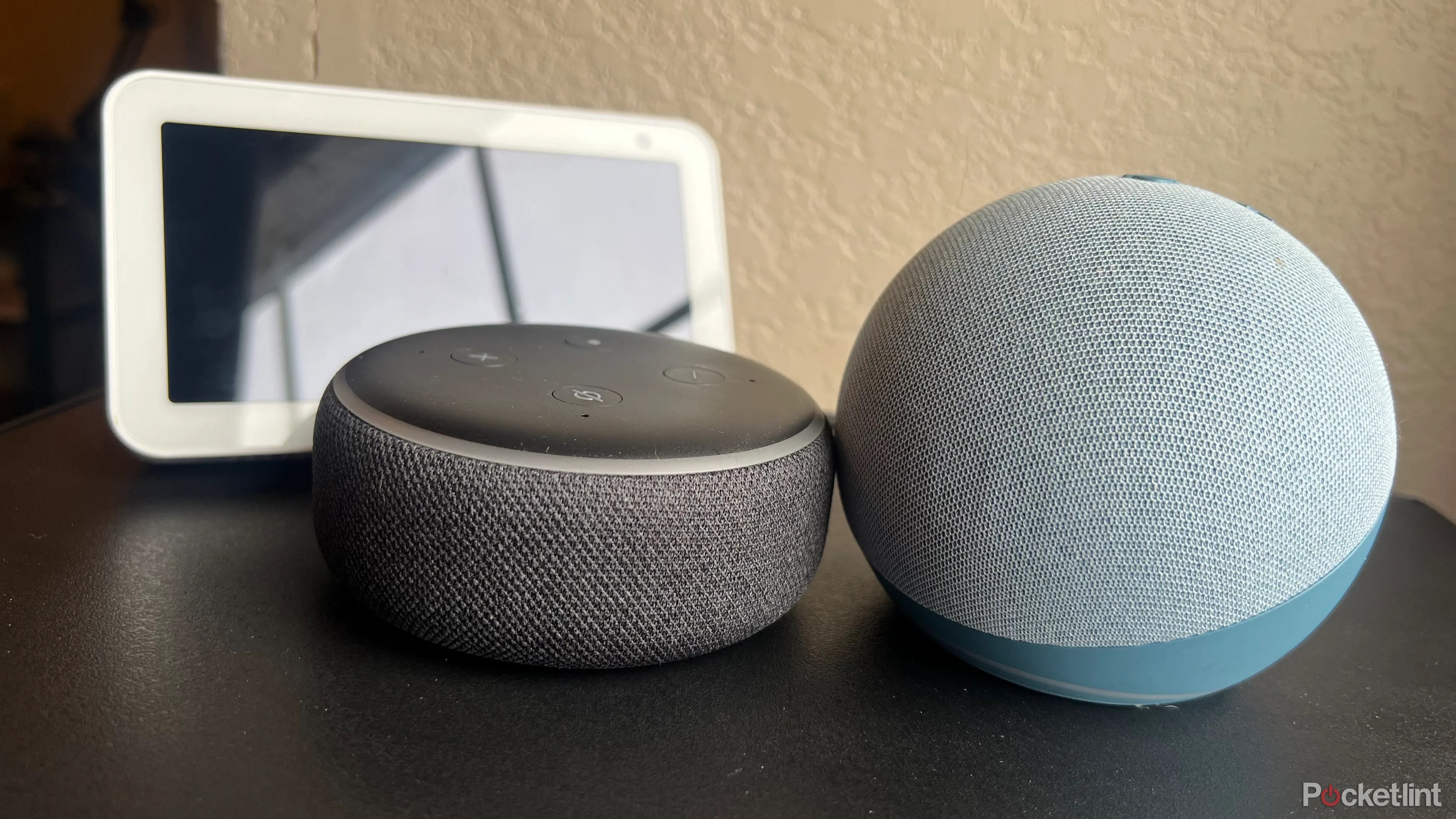 A 4th gen Echo, an Echo Dot, and an Echo Show.