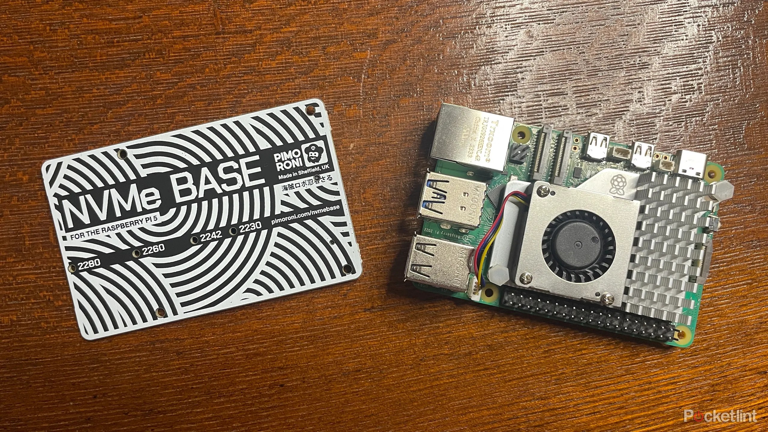 Pimoroni NVMe Base next to Raspberry Pi 5