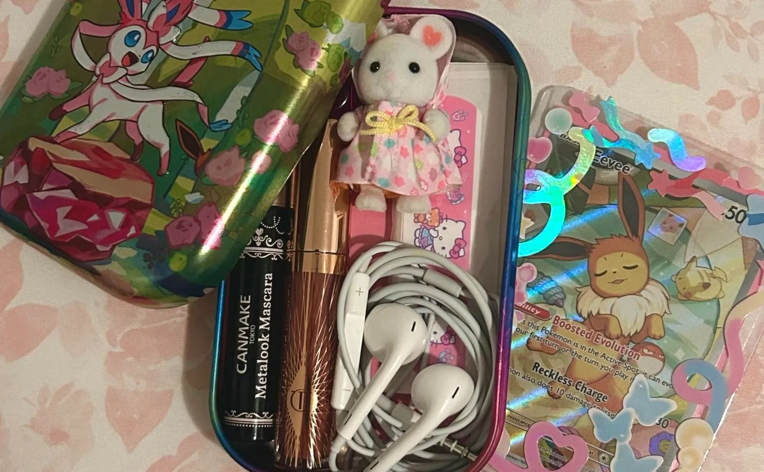 Pokémon fan accidentally lets hell loose after showing off her cute trading card tin