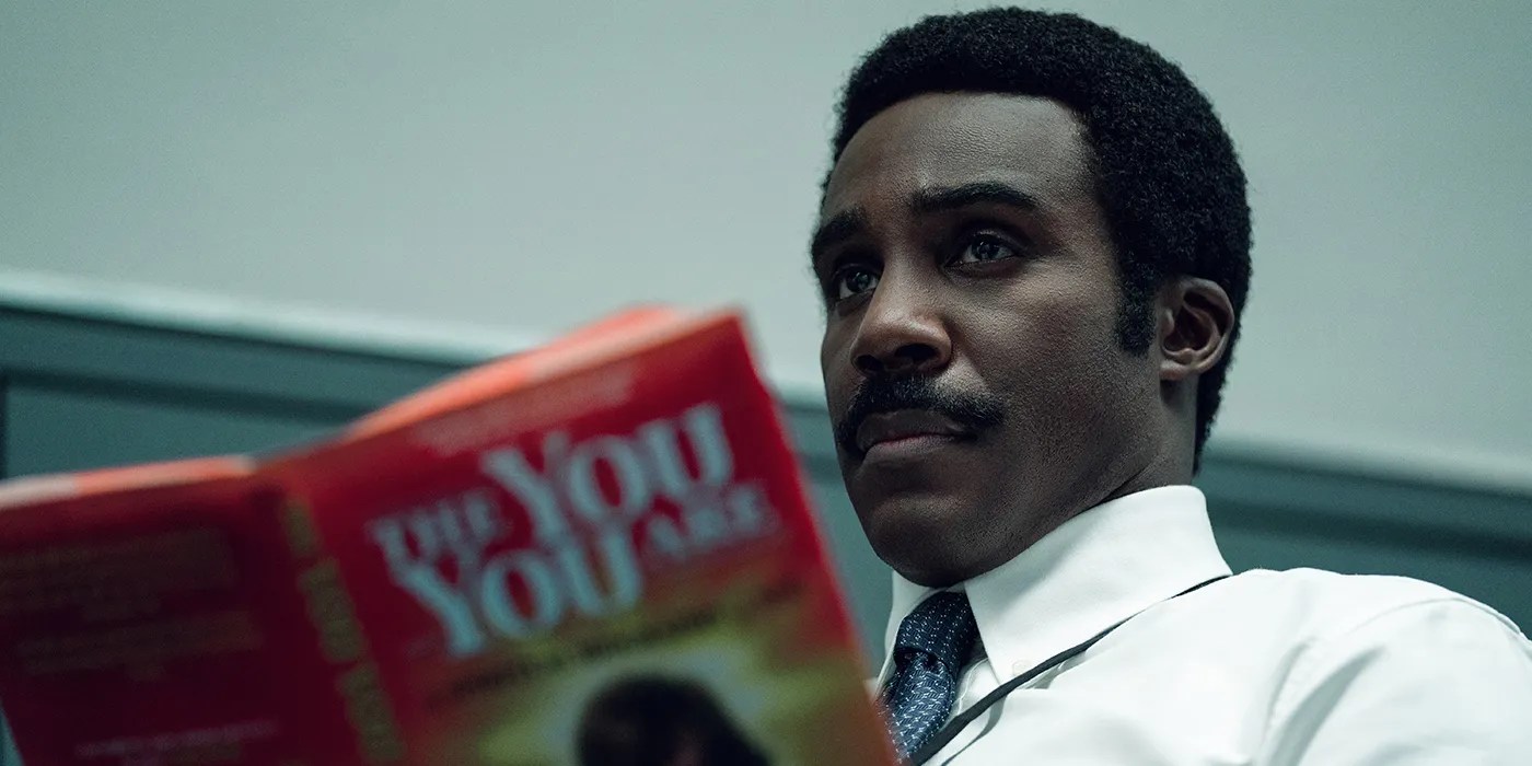 Milchick from Severance reading Ricken&rsquo;s book.