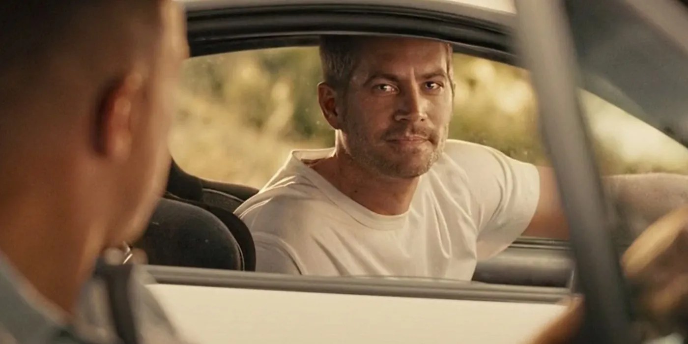 CGI Paul Walker looking over at Dom (Vin Diesel) through his car window at the end of Furious 7