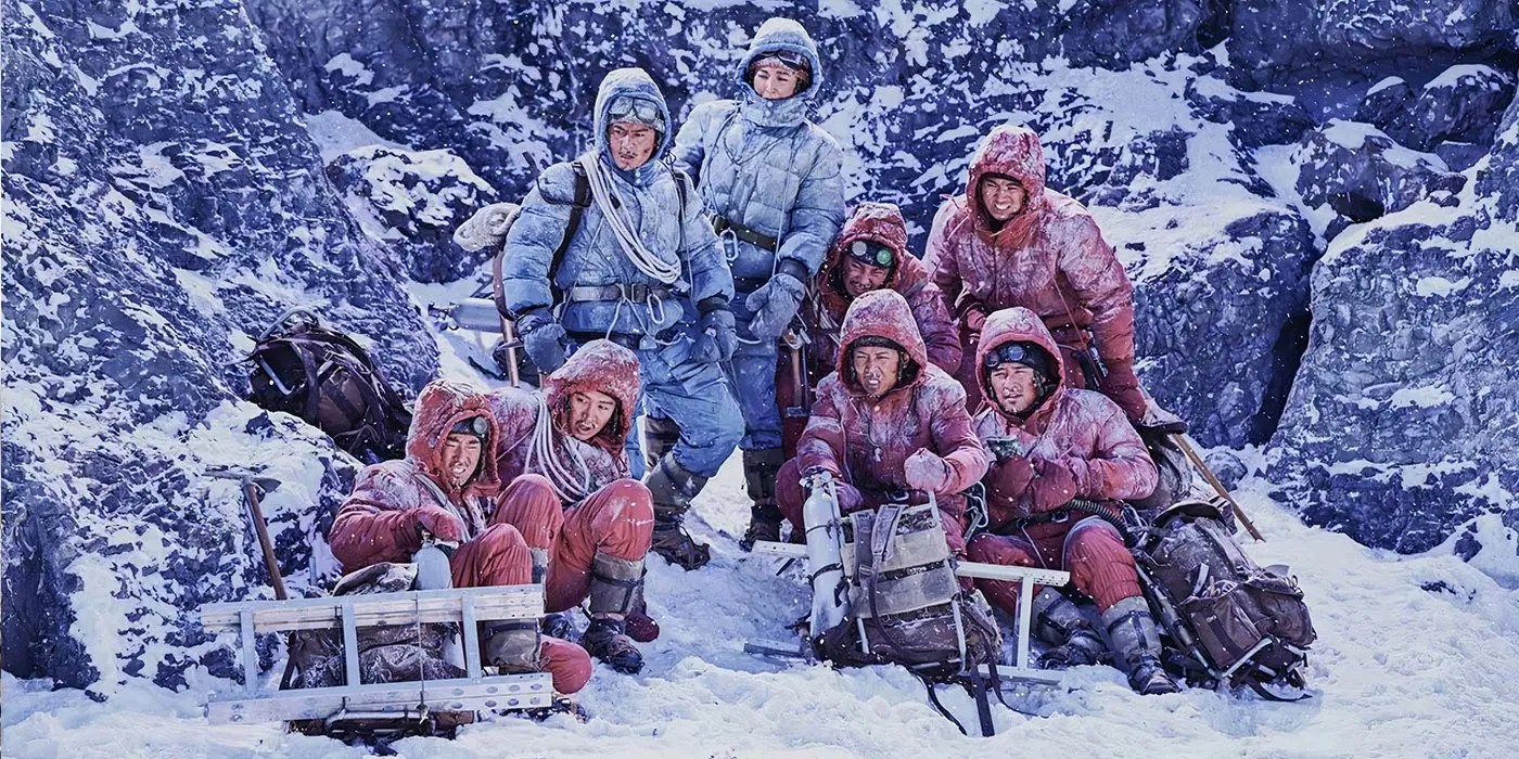 The Climbers 2019-1 - A Group Of Chinese Climbers Pose For A Photo In Red Jumpsuits For The Cold