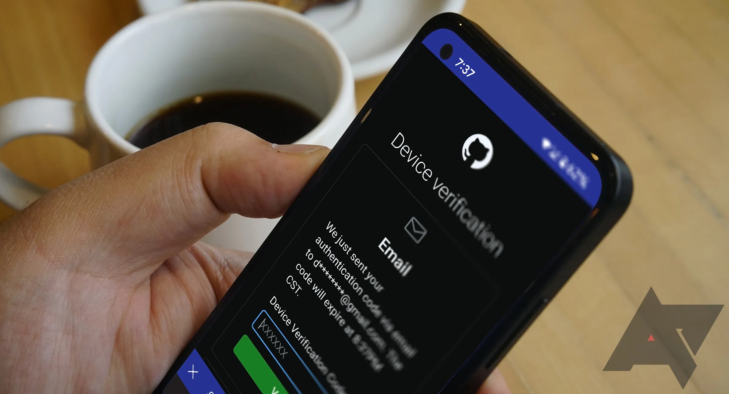 A phone screen showing two-factor authentication device verification.