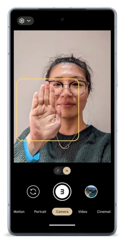 A person with their hand in the air