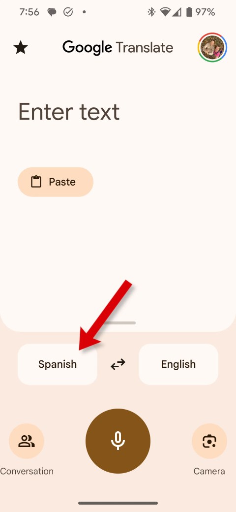A screenshot of the Google Translate app, showing how to change the source language