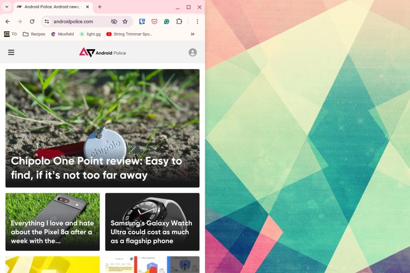 A Chrome window snapped to the left on a Chromebook with the Android Police website pulled up