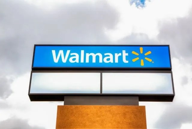 Walmart sign and a cloudy sky at the back.