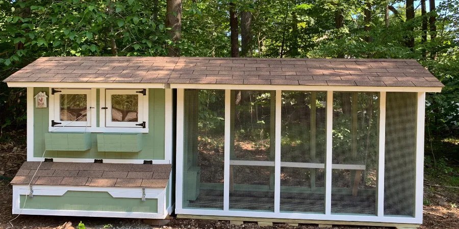 Attractive green chicken coop with run