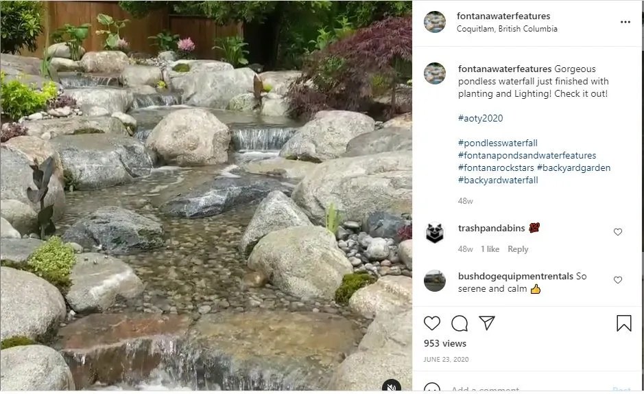 small waterfall cascading over small boulders and rockss