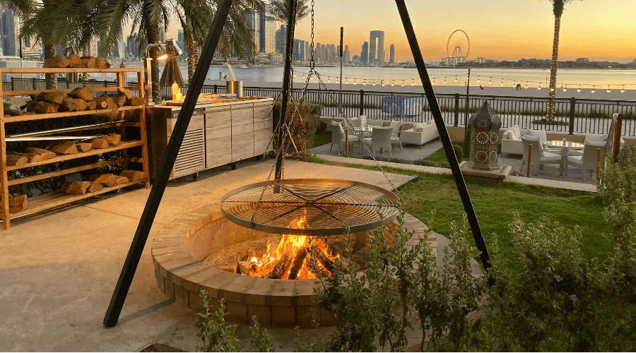 firepit with skyline in background