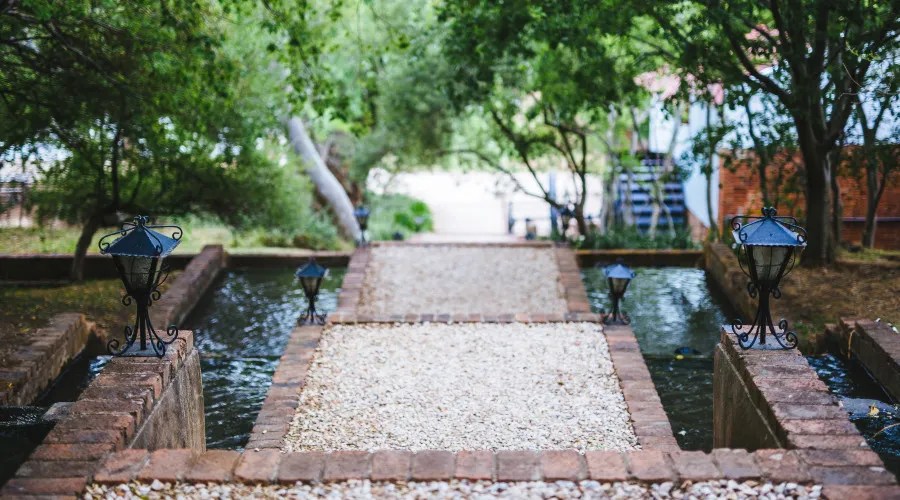 pond split by a walking path