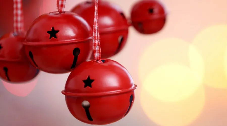 Jingle Bells on Blurred Christmas Lights