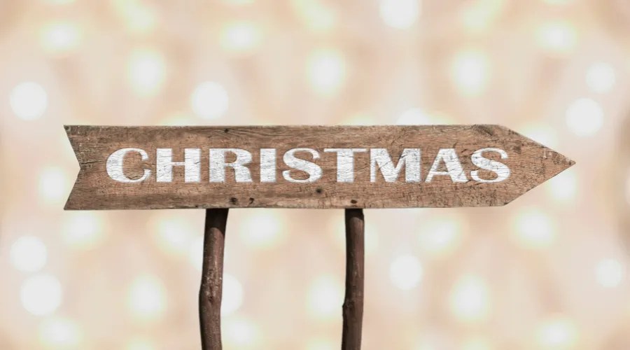 Christmas wooden arrow road sign