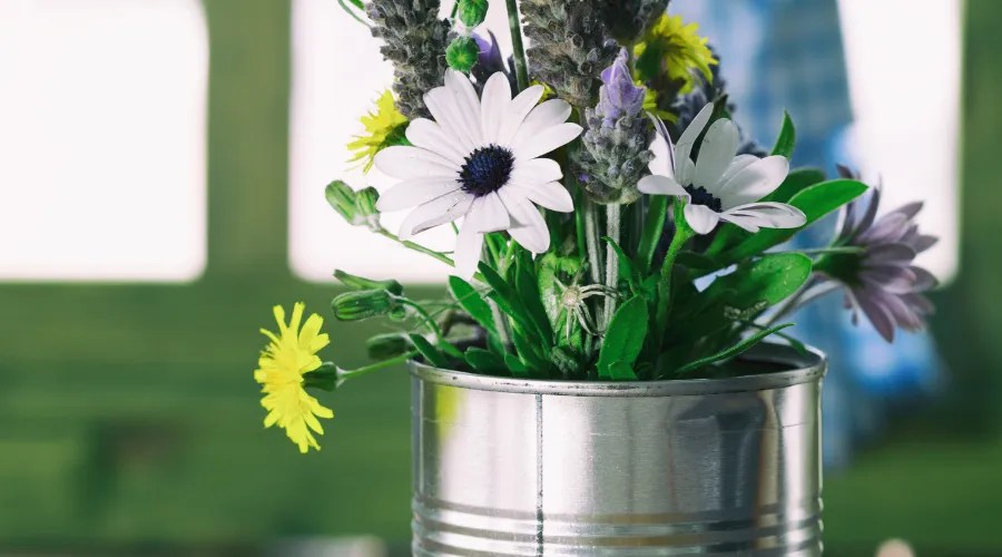 Tin can with flowers