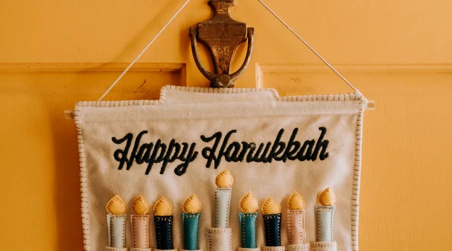 Close-Up Photo Of Happy Hanukkah Front Door Decor