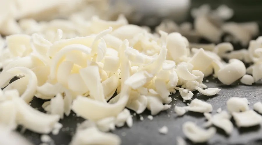 White Chocolate Shavings on Table, Closeup