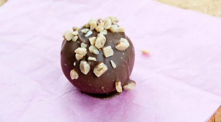 Milk chocolate truffle with walnuts