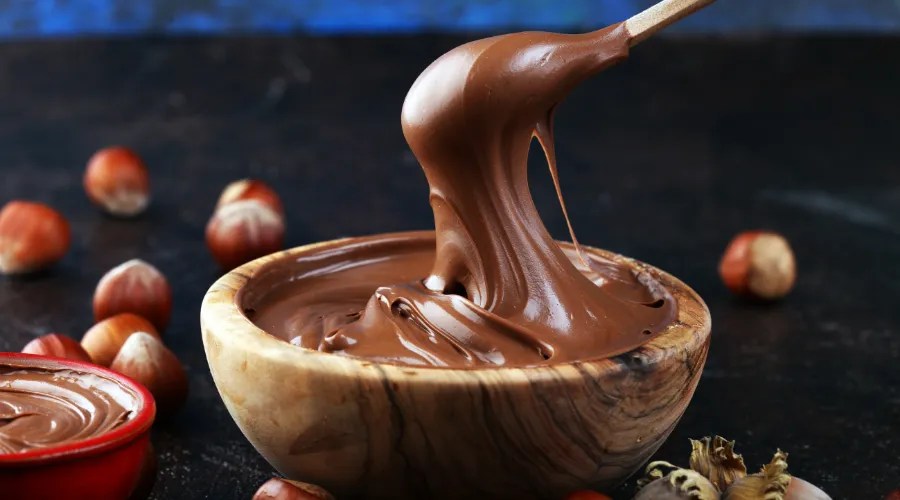 Homemade hazelnut spread in wooden bowl