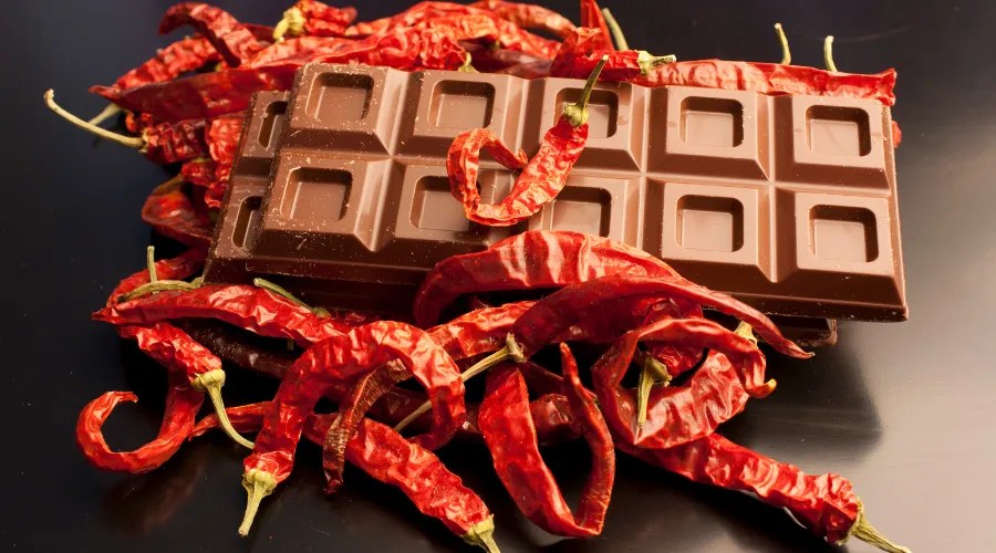 Chocolate bar and pepper