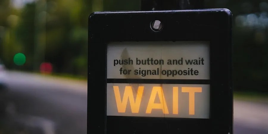 Wait signal at crosswalk