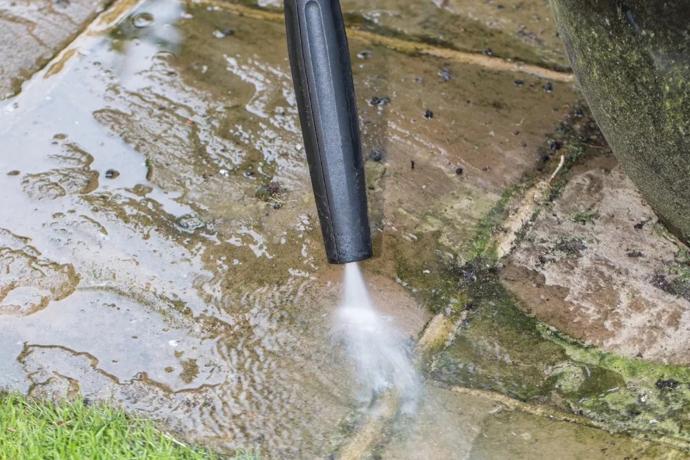 jet washing a patio