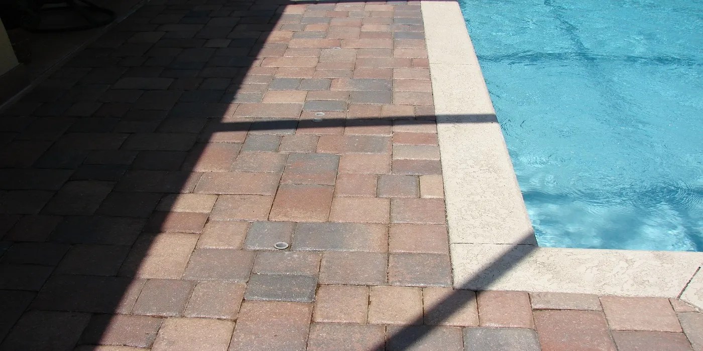 An image of a poolside deck