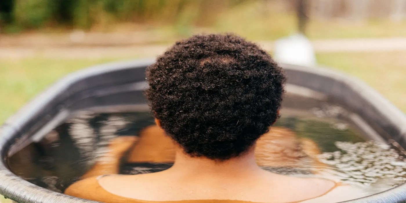 An image of a person in a cold plunge tub