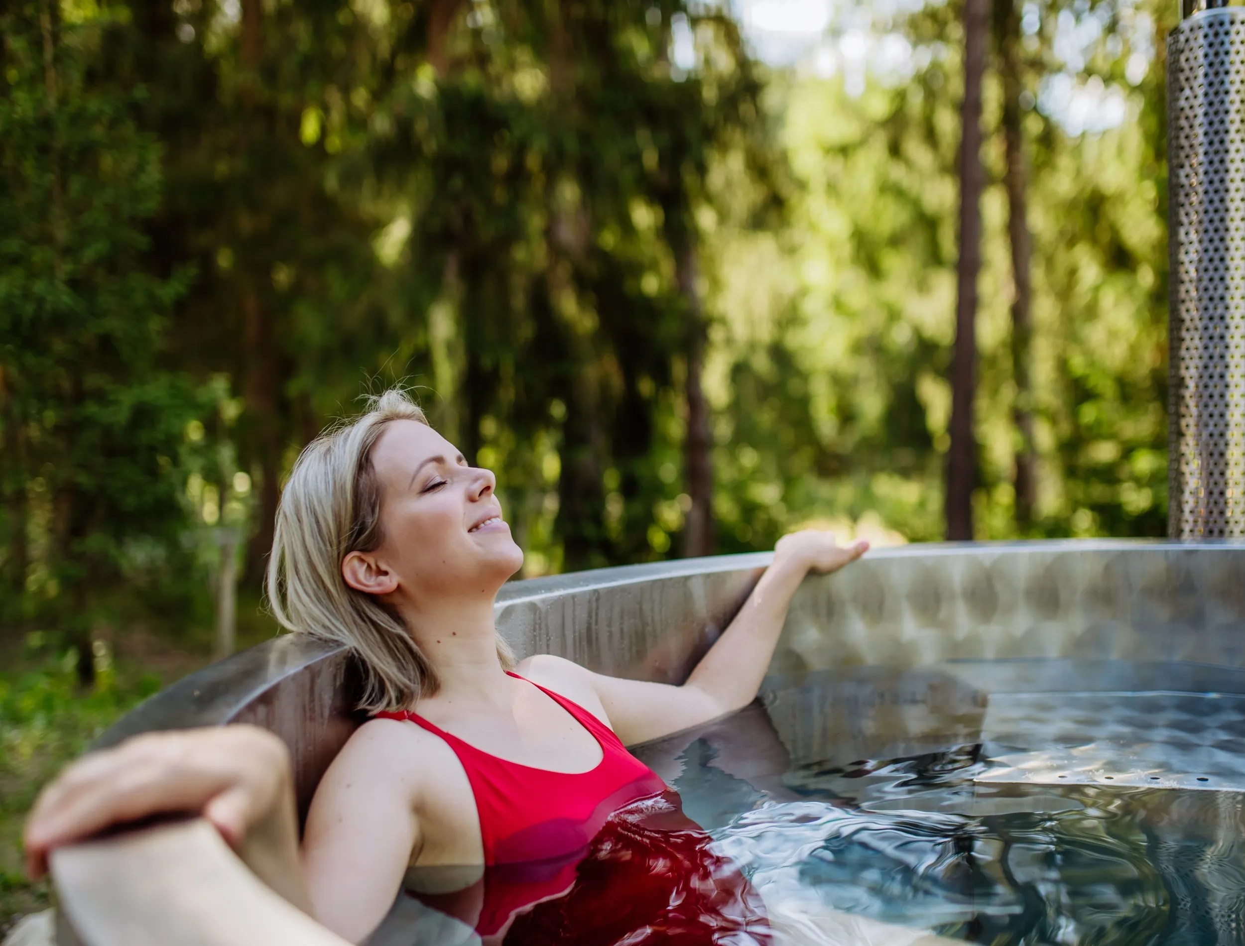 An image of a woman in a cold plunge tub