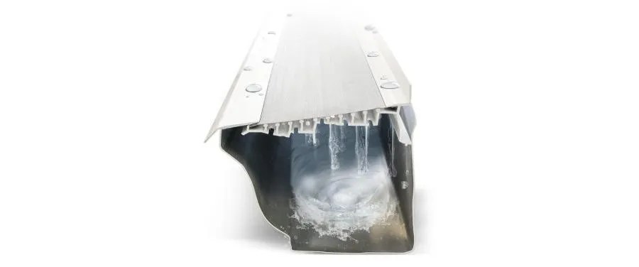 cross section of a LeafFilter gutter guard covering a gutter with water running through