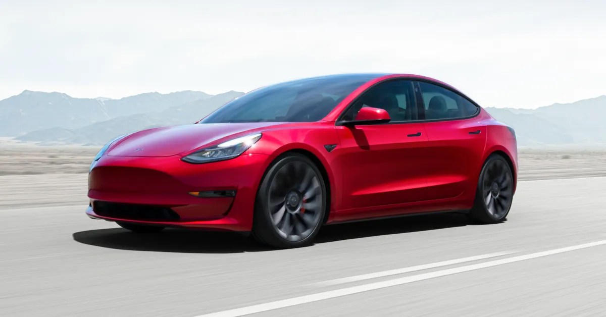 Here's Everything You Should Know About The Electrified Garage Tesla