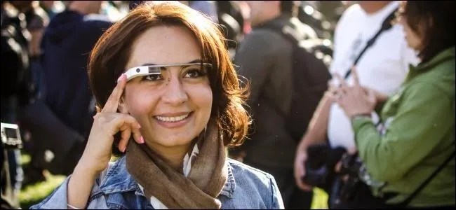 A woman wearing Google Glass.