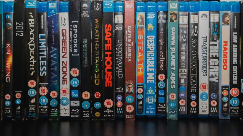Collection of Blu Ray Movies stacked on a table