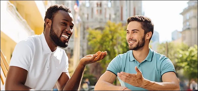 Two men engaged in a conversation.