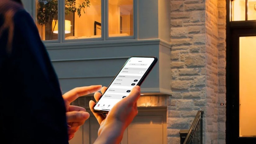 Person using Singled app to turn on lights