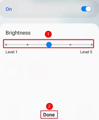 Adjust the flashlight brightness and tap &ldquo;Done.&quot;