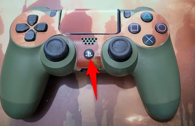 Press and hold down the PS button.