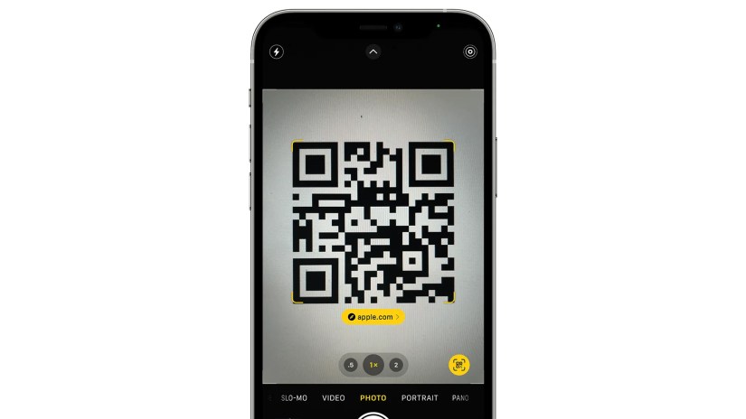 Scanning a QR code with the iPhone&rsquo;s camera.