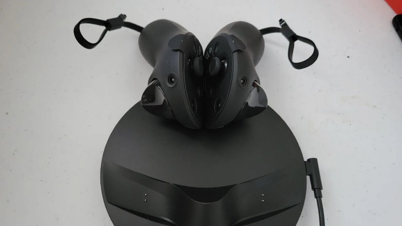 Meta Quest Pro controllers on the charging dock