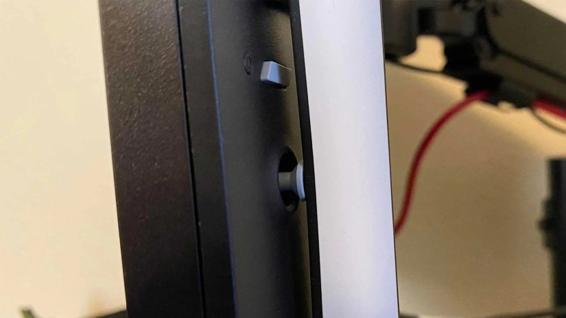 Philips Hue Play Gradient Lightstrip covering HyperX 24-inch monitor power button