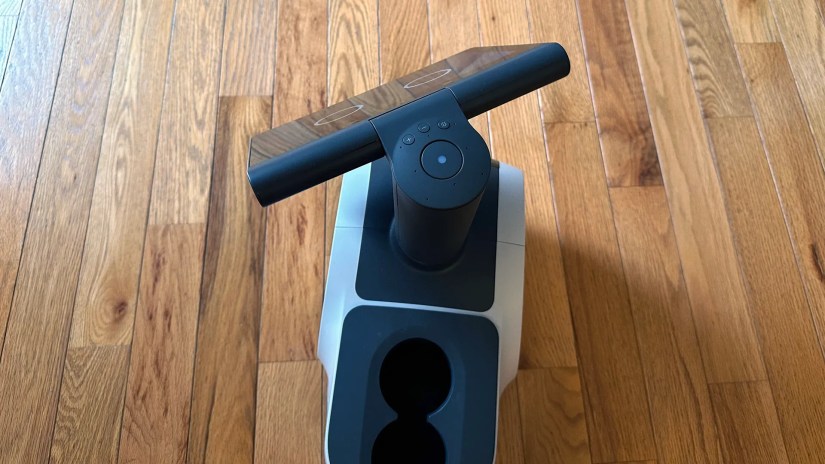 Top of Amazon Astro showing its physical buttons, periscope, and beverage tray
