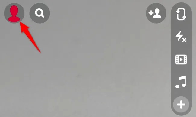 Select the profile icon or Bitmoji in the top-left corner.
