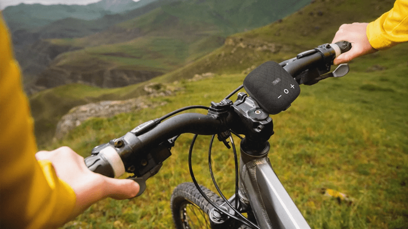 Tribit speaker attached to a bike handle