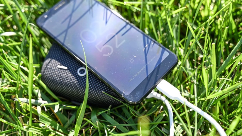 Tribit StormBox Micro 2 charging a smartphone